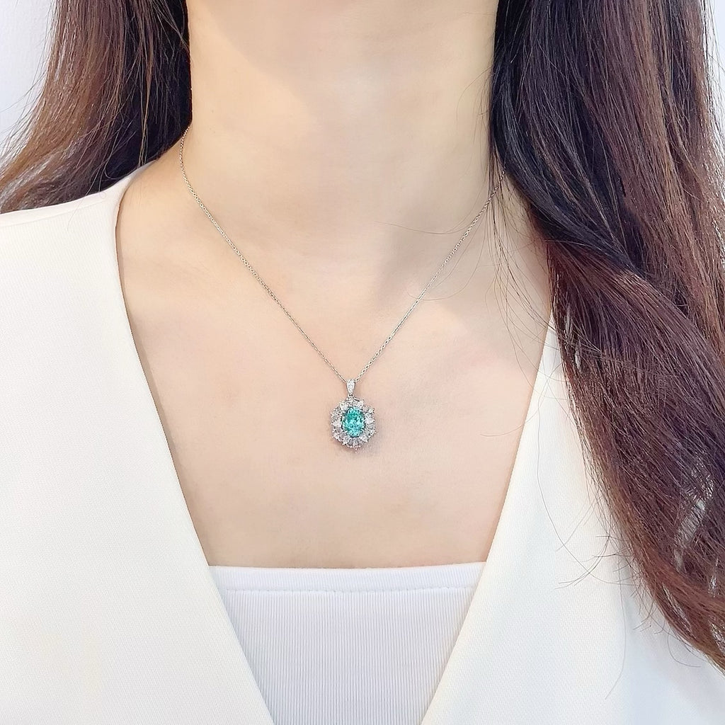 PT950 Lab-Grown Paraiba Tourmaline Oval Sunburst Diamond Halo Necklace | 3.20ct