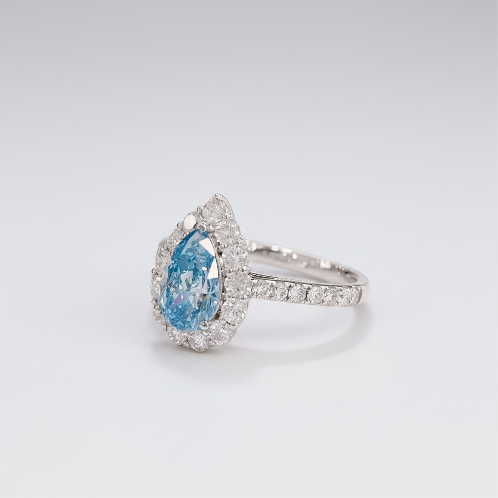 18K White Gold Lab-Grown Blue Diamond Pear Halo Ring - 45 Degree View